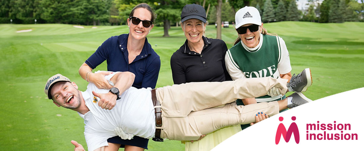 Group of participants on a golf course; several people are posing together, including one person being held horizontally, during a networking or fundraising activity. The Mission inclusion logo appears in the lower-right corner.